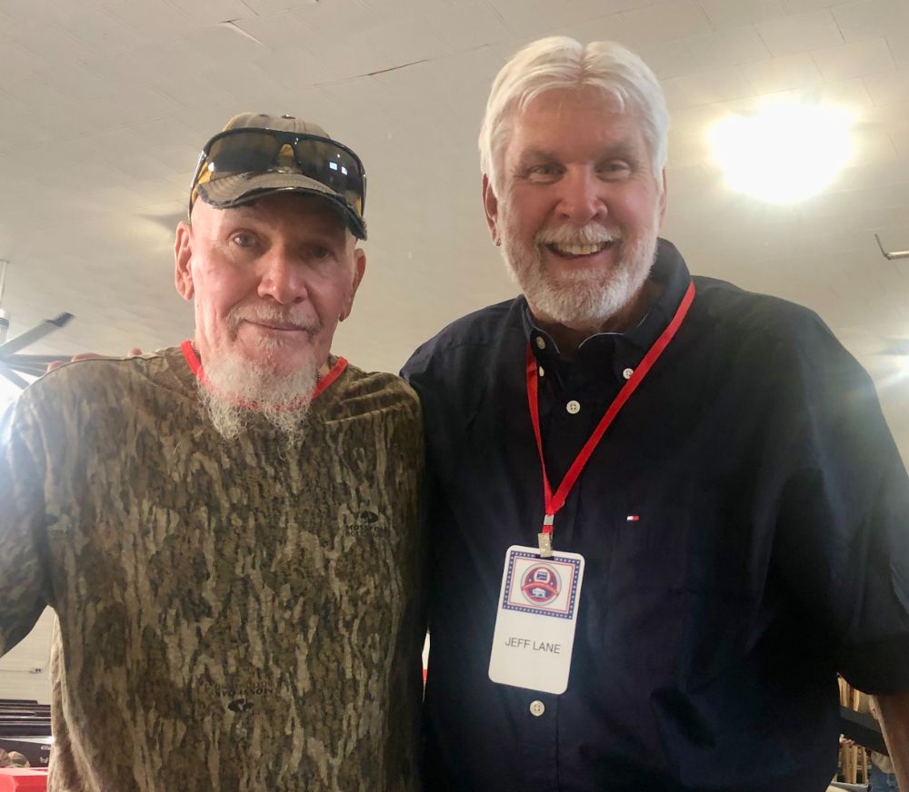 WWCA President Jeff Lane with a longtime member at the Memorial Weekend Gun Show.